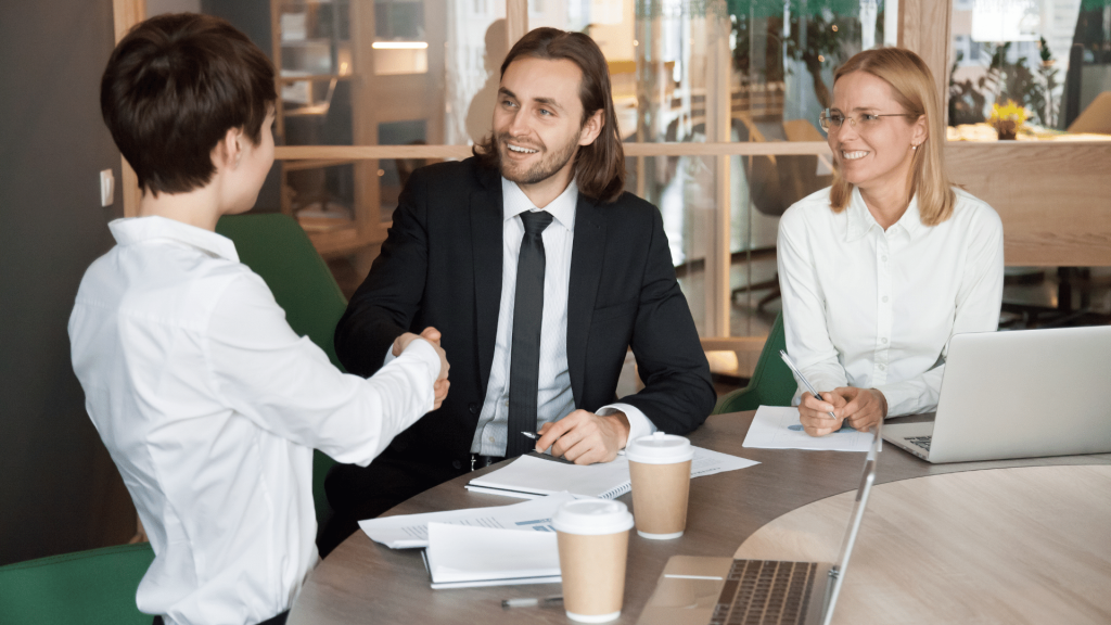 software consultant working with a client on software solutions