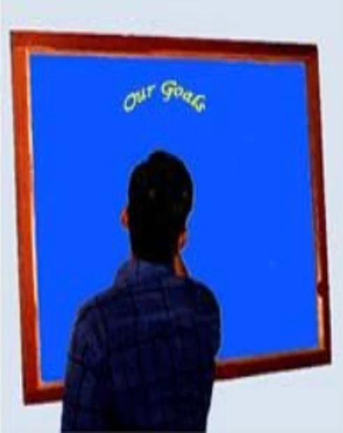 Person writing goals on board representing learning objectives and career goals in IT training at Regent iTech.